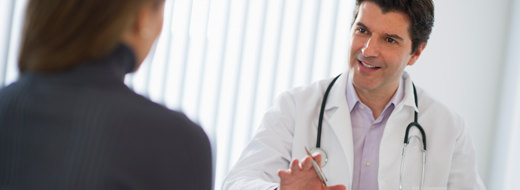 doctor speaking with patient